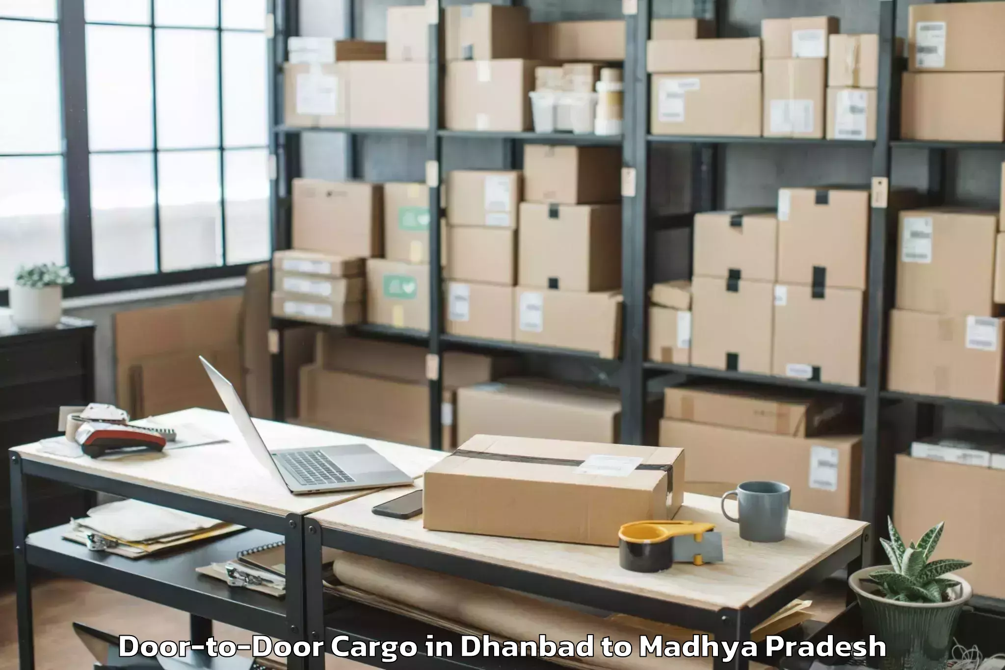 Quality Dhanbad to Tonk Khurd Door To Door Cargo